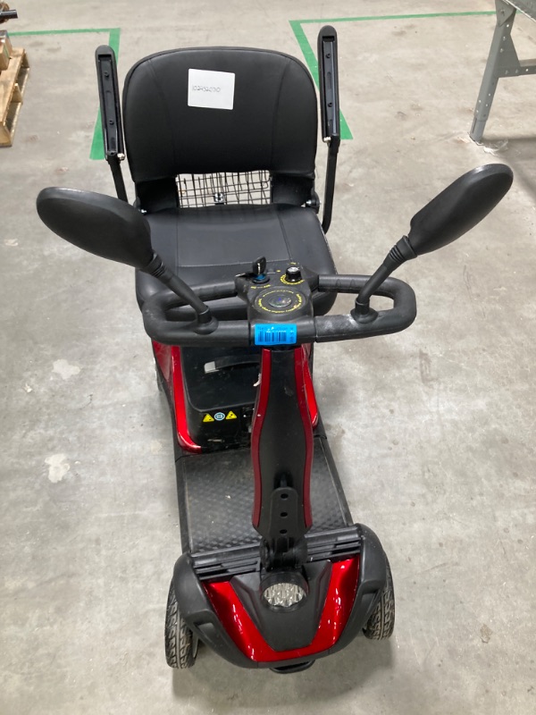 Photo 9 of 4-Wheel Mobility Scooter for Adults and Seniors - Long Range, Smart Safety Features, Rotating Seat, LED Headlights, All-Terrain, Travel-Friendly, Includes cup holder, rearview mirrors, and Two baskets
***Rear righthand tire damaged***