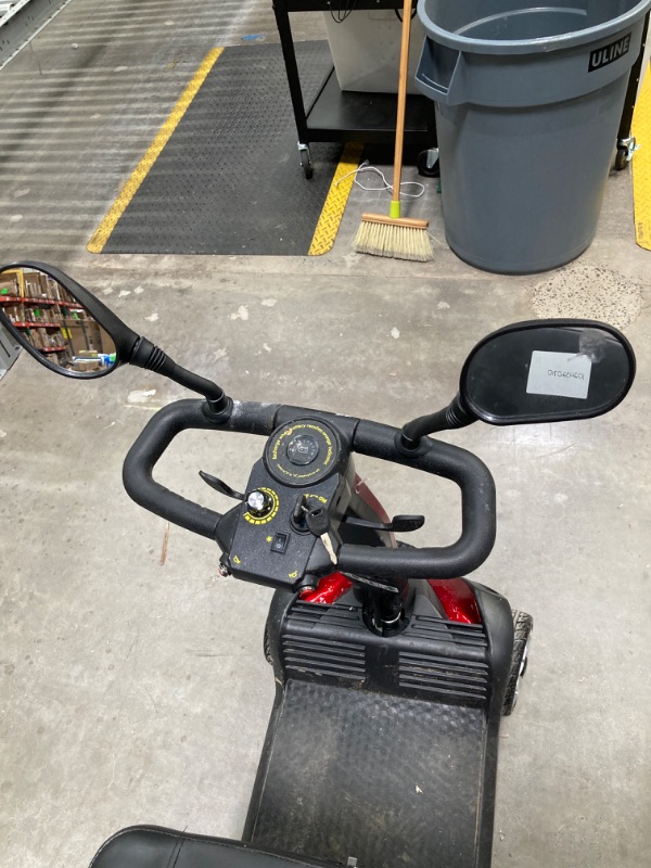 Photo 5 of 4-Wheel Mobility Scooter for Adults and Seniors - Long Range, Smart Safety Features, Rotating Seat, LED Headlights, All-Terrain, Travel-Friendly, Includes cup holder, rearview mirrors, and Two baskets
***Rear righthand tire damaged***