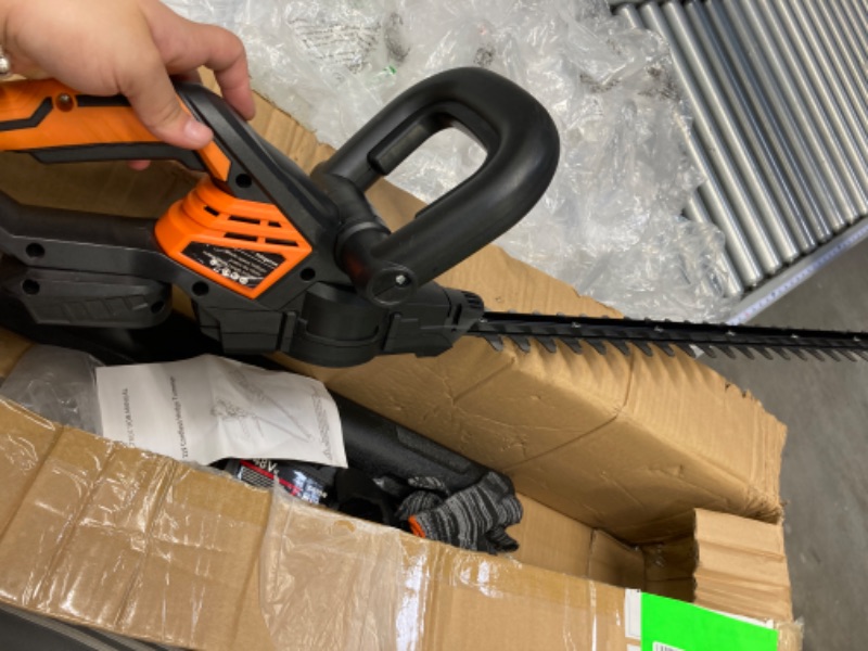 Photo 2 of **see notes** Hedge Trimmer Cordless , HDJ 21-Inch Steel Blade Max Cordless Hedge Trimmer with 48V Battery and Fast Charger, Electric Hedge Trimmer Cordless, Black and Orange
