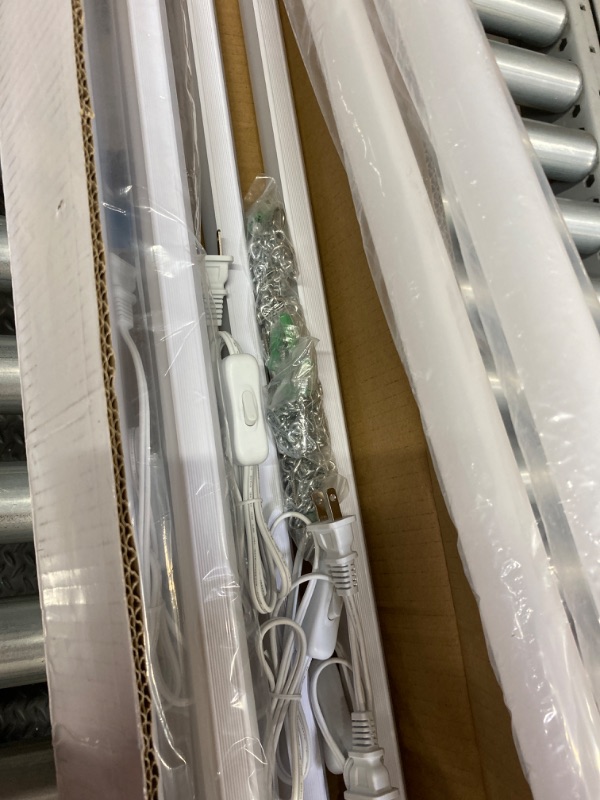 Photo 1 of Ensenior 4 Pack Linkable LED Utility Shop Light with E26 Socket Adapter, 4 FT, 4400LM, 36W Eqv 280W, 5000K Daylight, 48 Inch Shop Light for Garage, Surface or Hanging Mount, White, ETL Certified White - E26 4 PACK