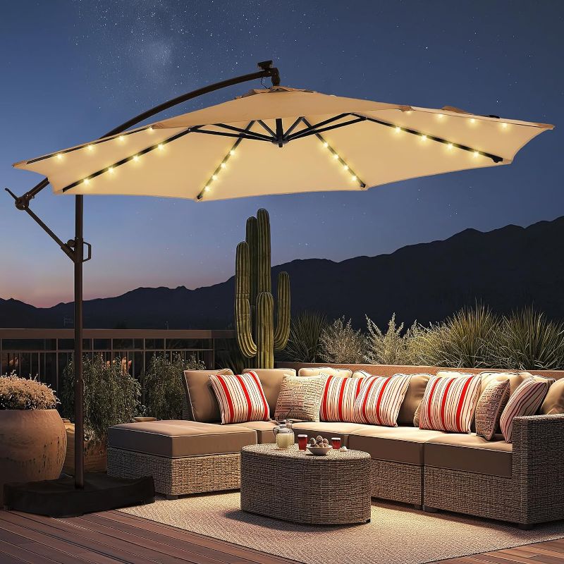 Photo 1 of 10ft Solar Lights Offset Cantilever Patio Umbrella - w/Light, LED Lighted Offset Hanging Patio Outdoor Market Umbrella UPF50+ UV Protection with Easy Tilt and Crank (Beige)