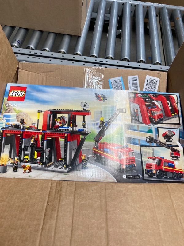 Photo 3 of LEGO City Fire Station with Fire Truck Toy, Action Packed Fire Station Toy Playset, Birthday Gift Idea for Kids Ages 6 and Up who Love Pretend Play Toys, Includes a Dog Figure and 5 Minifigures, 60414
