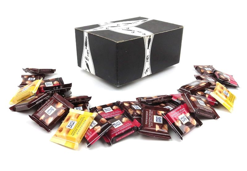 Photo 1 of Ritter Sport Nut Selection Mini Chocolate Squares, 1 lb Bag in a BlackTie Box