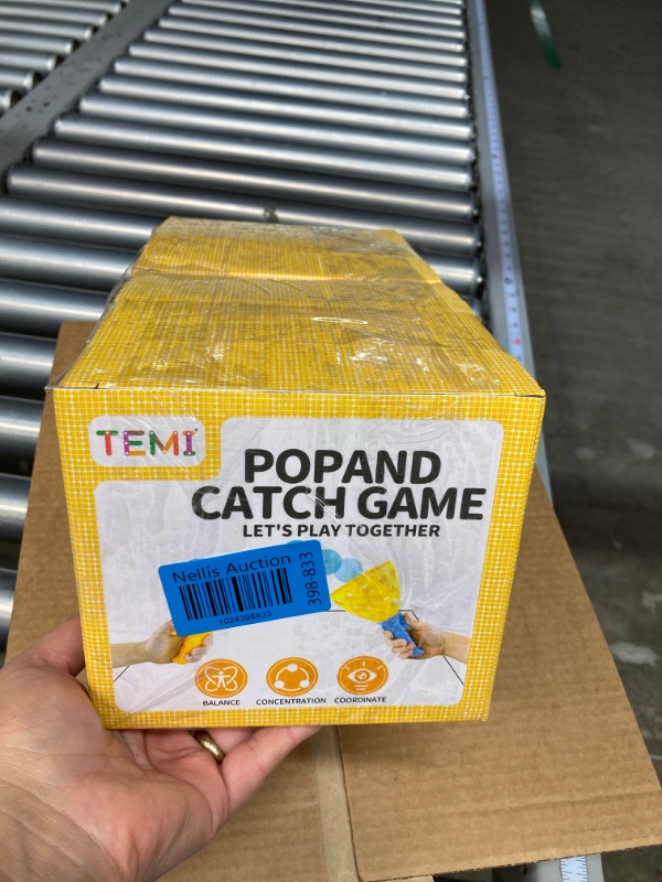 Photo 4 of **2 Packs** TEMI Pop Pass Catch Ball Game with 4 Catch Launcher Baskets and 20 Balls, Beach Toys Backyard Outdoor Indoor Game Age 3 4 5 6 7 8 9 10+ Years Old Boys Girls Kids Adults Family Christmas Easter Gifts