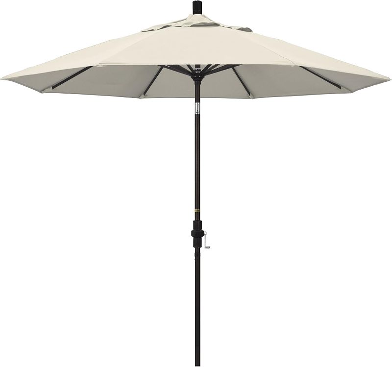 Photo 1 of California Umbrella 9' Round Aluminum Market Umbrella, Crank Lift, Collar Tilt, Bronze Pole, Antique Beige Olefin
