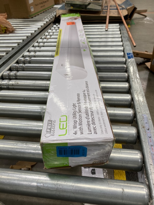 Photo 1 of Feit Electric
4 ft. 64-Watt Equivalent Direct Wire or Plug-in Integrated LED White Motion Wrap Utility Shop Light with Remote