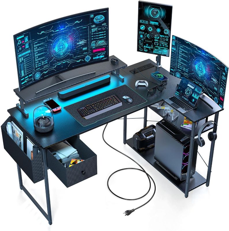 Photo 1 of Limited-time deal: DOMICON L Shaped Gaming Desk, 47 inch Computer Desk with LED Lights & Adjustable Stand, Power Outlets & Storage Drawer, Reversible Computer Desk with Shelves & Headset Hooks Black Carbon Fiber 