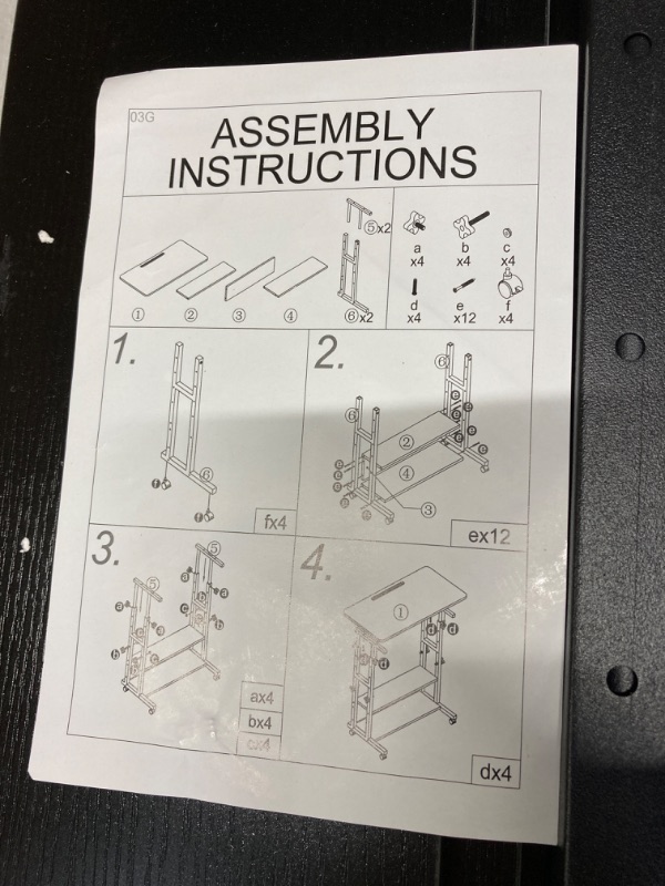 Photo 4 of Small Standing Desk Adjustable Height, Mobile Stand Up Desk with Wheels, 32 Inch Portable Rolling Desk Small Computer Desk, Portable Laptop Desk Standing Table Sit Stand Home Office Desks Black **Not Exact Photo**