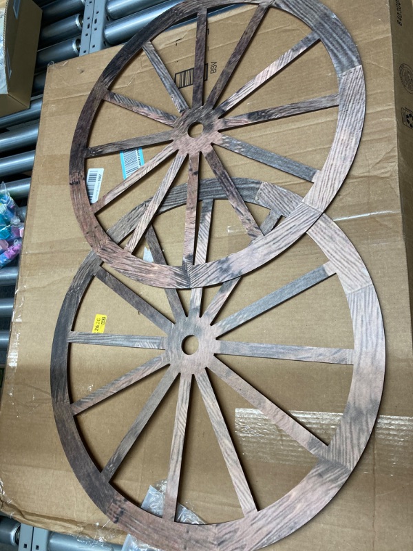 Photo 2 of 2 Pieces Wagon Wheel Decor Wooden Wagon Wheel Western Style Wall Hanging Old Wagon Wheels Vintage Rustic Wall Wood Cartwheel Decor Wood Decorative Garden Wagon Wheel for Bar Patio Garage (24 Inch)