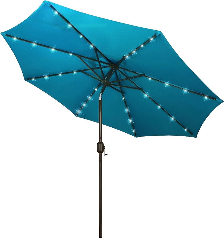 Photo 1 of Blissun 9 ft Solar Umbrella 32 LED Lighted Patio Umbrella Table Market Umbrella with Tilt and crank Outdoor Umbrella for Garden, Deck, Backyard, Pool and Beach (Cerulean)