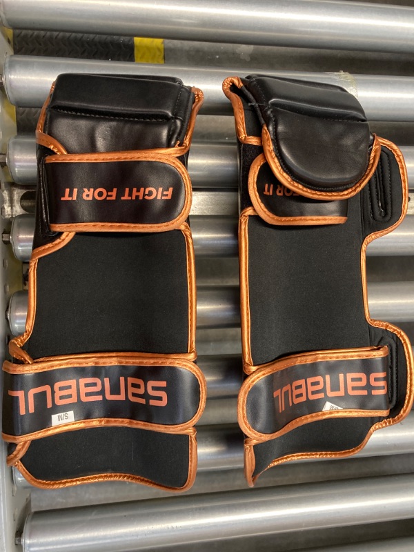 Photo 3 of Sanabul Essential Kickboxing Shin Guards with Hook & Loop Straps | Pro-Tested & Versatile Shin Pads for MMA, Muay Thai, and Kickboxing - Tailored for Comfort and Mobility, Small, Metallic Copper