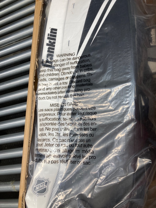 Photo 1 of Franklin Sports Street Hockey Goalie Equipment Set - NHL Youth Street Hockey Goalie Pads - Leg Pads, Catch Glove, and Blocker - Youth Goalie Gear