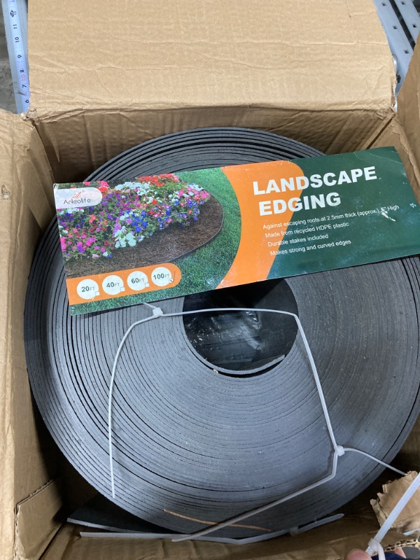 Photo 1 of Black Plastic Garden Landscape Edging, 5” Tall Border Coil, Flexible and Strengthened with Anti-UV Treatment (100ft with 30pcs Stakes)