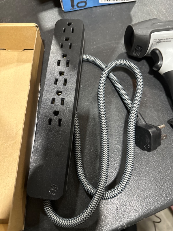 Photo 1 of GE 6-Outlet Power Strip, 6' Cord, Black - Extension Cords
