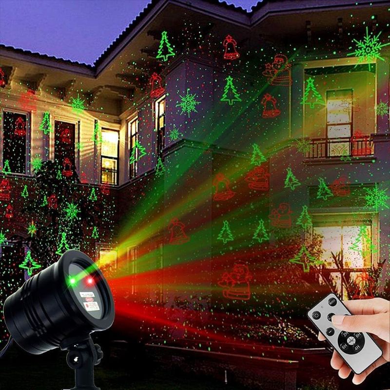 Photo 1 of  LIGHT Christmas Laser Lights, Projector Lights Landscape Spotlight Red and Green Star Show with Christmas Decorative Patterns for Indoor Outdoor Garden Patio Wall