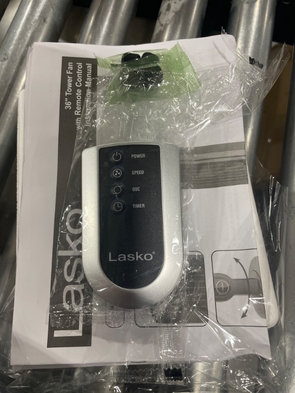 Photo 1 of Lasko Oscillating Tower Fan, Remote Control, Timer, Dark Mode, 4 Speeds, for Bedroom, Living Room, and Office, 36”, Black, T36511, Large