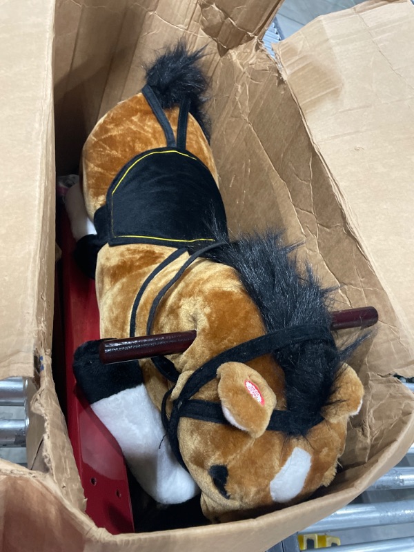 Photo 1 of Spring Rocking Horse Plush Ride on Toy with Adjustable Foot Stirrups and Sounds for Toddlers to 5 Years Old by Happy Trails - Brown