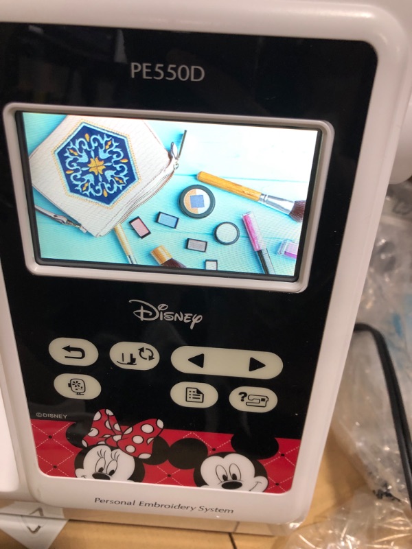 Photo 6 of Brother PE550D Embroidery Machine, 125 Built-in Designs Including 45 Disney Designs, 4" x 4" Hoop Area, Large 3.2" LCD Touchscreen, USB Port, 9 Font Styles