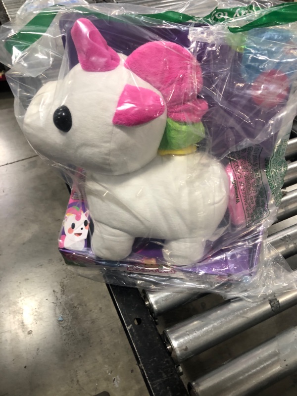 Photo 2 of Adopt Me! Neon Unicorn 12-Inch Light-Up Plush - Soft and Cuddly - Three Light-Up Modes - Directly from The #1 Game, Toys for Kids - Ages 6+