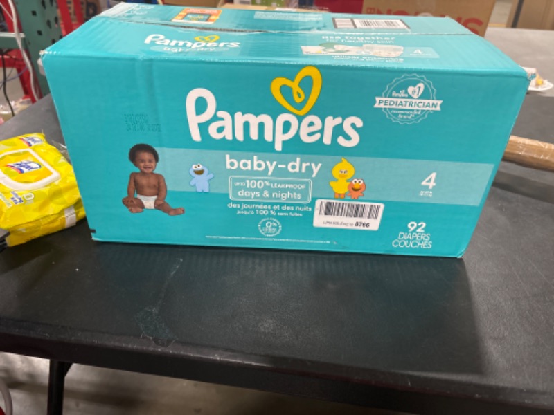 Photo 2 of Diapers Size 4, 92 Count - Pampers Baby Dry Disposable Baby Diapers, Super Pack, Packaging Size 4 