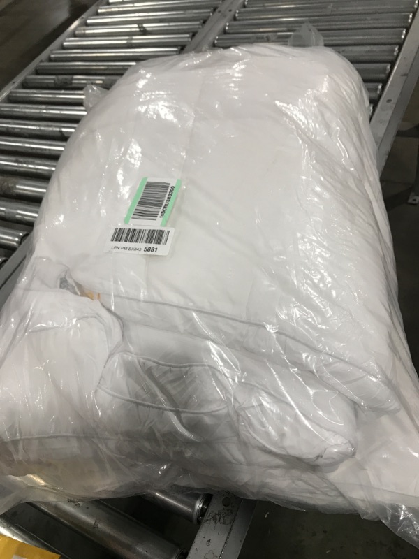 Photo 1 of LARGE WHITE BED COMFORTER UNKNOWN SIZING 