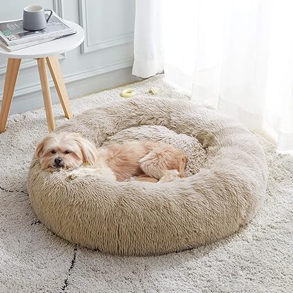 Photo 1 of Calming Dog Bed & Cat Bed, Anti-Anxiety Donut Dog Cuddler Bed, Warming Cozy Soft Dog Round Bed, Fluffy Faux Fur Plush Dog Cat Cushion Bed for Small Medium Dogs and Cats (20"/24"/27"/30")