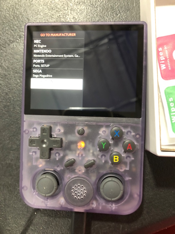 Photo 3 of RG353V Retro Handheld Game with Dual OS Android 11 and Linux,RG353V with 64G TF Card Pre-Installed 4452 Games Supports 5G WiFi 4.2 Bluetooth Online Fighting,Streaming and HDMI RG353V-Purple transparent-new