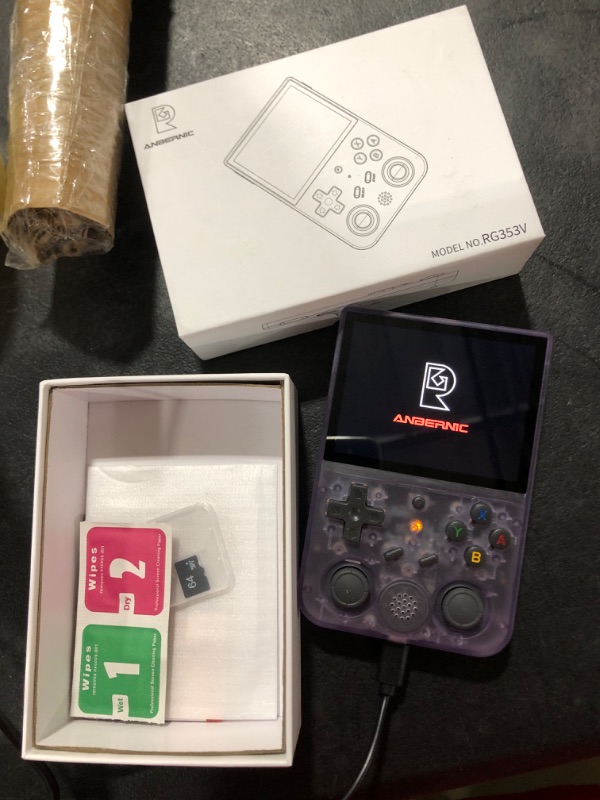 Photo 2 of RG353V Retro Handheld Game with Dual OS Android 11 and Linux,RG353V with 64G TF Card Pre-Installed 4452 Games Supports 5G WiFi 4.2 Bluetooth Online Fighting,Streaming and HDMI RG353V-Purple transparent-new