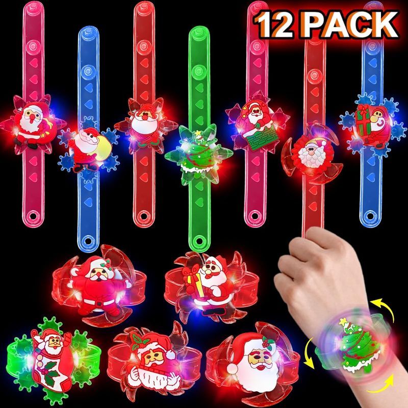 Photo 1 of AMENON [ Rotating Fidget ] 12 Pack Christmas Spin LED Bracelets Christmas Stocking Stuffers Gifts for Kids Toys 12 Styles Flashing Light Up Toys Christmas Party Favors Glow in the Dark Party Supplies
