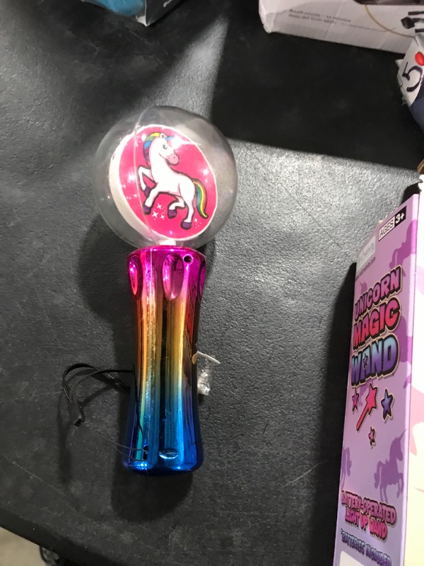 Photo 2 of ArtCreativity Light Up Magic Unicorn Wand, 7.5 Inch LED Spinning Wand Toy for Kids, Batteries Included, Great Gift Idea for Boys and Girls, Unicorn Birthday Party Favor, Carnival Prize1024463825
