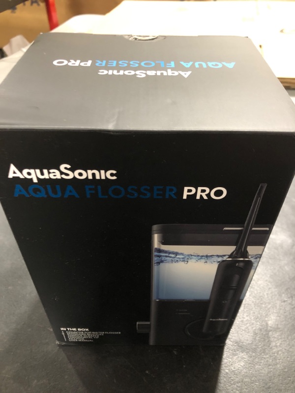 Photo 3 of AquaSonic Aqua Flosser PRO | Professional Water Flosser with Large Capacity Reservoir | Oral Irrigator w/ 2 Modes, 10 levels of Water Pressure, 4 Included Tips | Sleek & Compact | Dentist Recommended Black