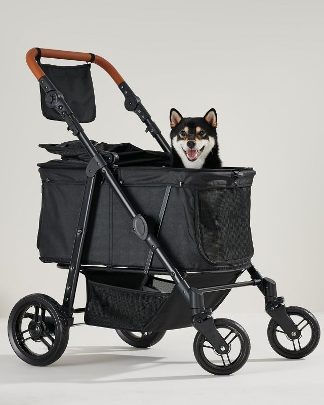 Photo 1 of Medium Pet Stroller for Dogs Up to 66lbs, Adjustable Handle, 180 ? Canopy, 4 Wheels for Medium/Large Dogs and Cats, Waterproof Pad

