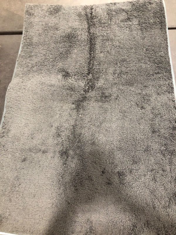 Photo 1 of DARK BLUE AREA RUG UNKNOWN DIMENSIONS