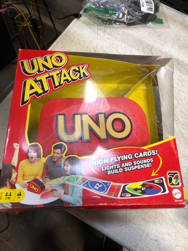 Photo 2 of Mattel Games UNO ATTACK! Card Game with Random Shooter for 2 ro 10 Players Ages 7 Years and Older