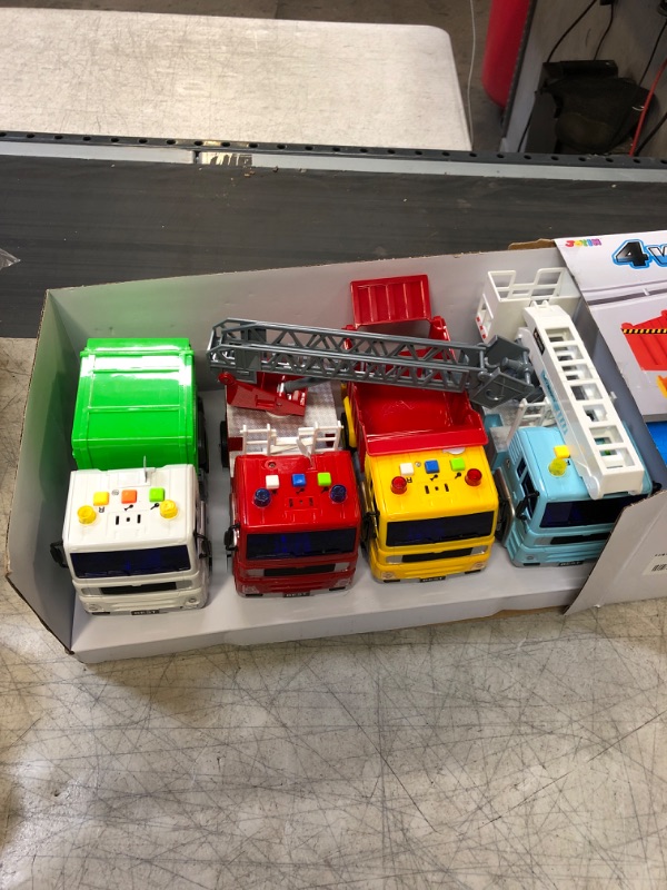 Photo 3 of JOYIN 4 Pack Friction Powered City Vehicles Including Garbage Truck, Fire Engine Truck, Boom Lift Truck and Construction Dump Truck with Lights and Sounds