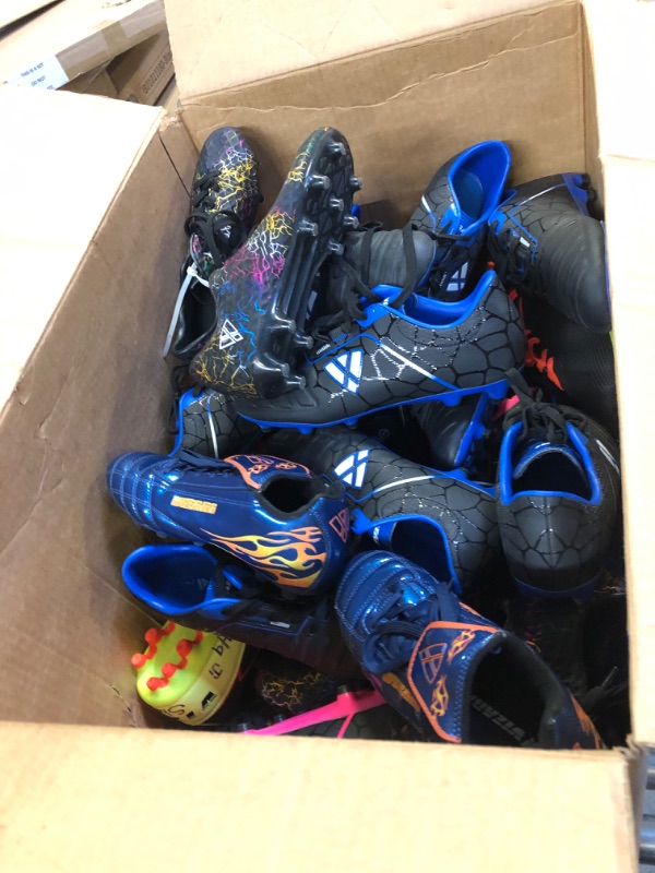 Photo 1 of BOX FULL OF SHOES AND CLEATS SIZE UNKNOWN FINAL SALE NO RETURNS 