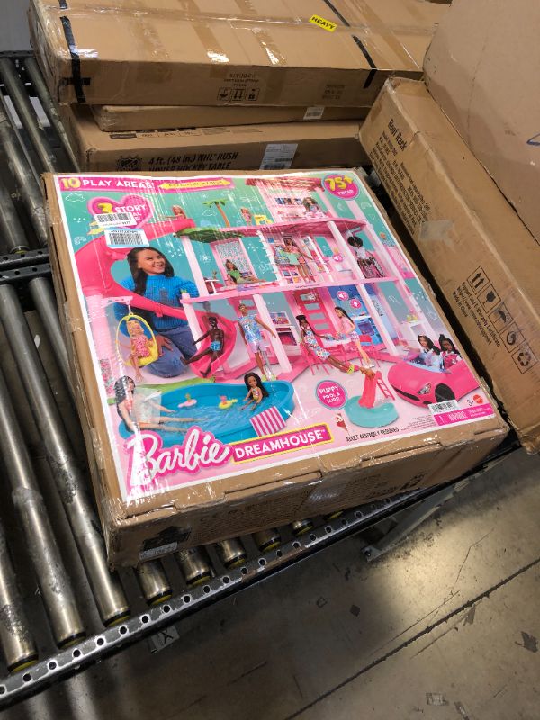 Photo 1 of Barbie Dreamhouse 2023, Pool Party Doll House with 75+ Pieces and 3-Story Slide, Barbie House Playset, Pet Elevator and Puppy Play Areas?