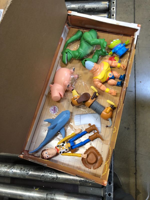 Photo 2 of Disney and Pixar Toy Story Set of 7 Action Figures with Woody, Slinky, Rex, Hamm, Alien, Rocky & Shark, Disney100 Collectible [Amazon Exclusive]