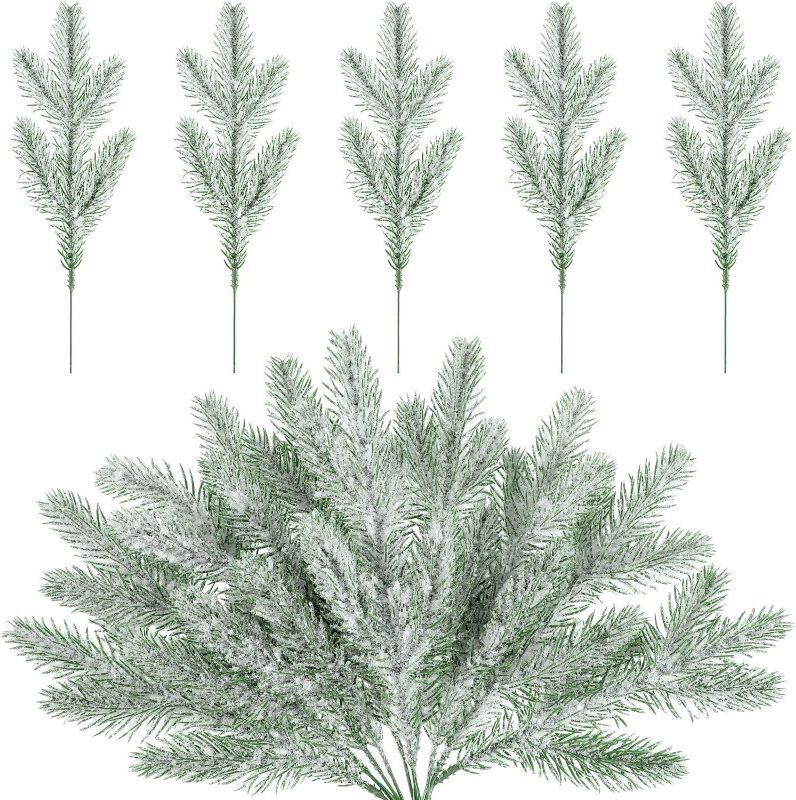 Photo 1 of 30 Pcs Snow Frosted Pine Branches Christmas Artificial Pine Leaves Branches Fake Greenery Plants Pine Sprigs Green Christmas Tree Picks Faux Greenery Stems for DIY Garland Crafts Winter Decorations
