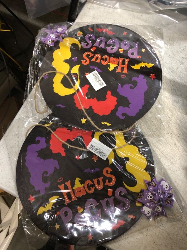 Photo 2 of 2 pack 
ROCWOHO Halloween Hocus Pocus Wooden Door Hanger I Smell Children Hanging Sign Front Door Decor Welcome Wreath Indoor Outdoor Wall Decorations for Halloween Party Supplies (Black)