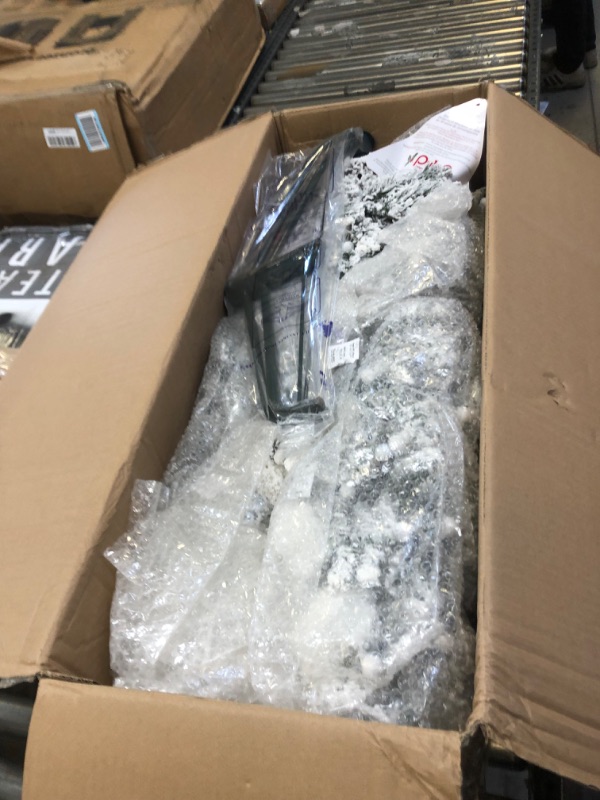 Photo 1 of Puleo International 7.5 ft Pre Flocked Slim Whistler Pine Artificial Christmas Tree with Sure-Lit Pole, Green