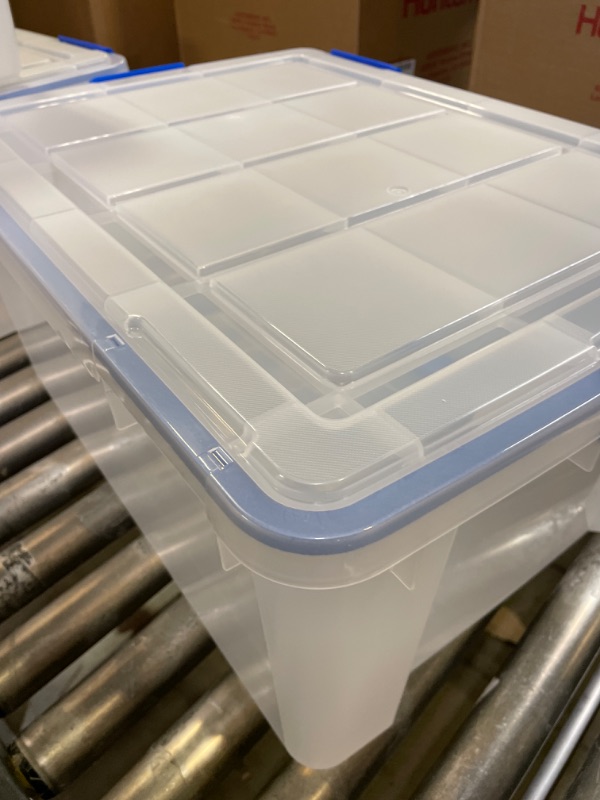 Photo 2 of 1 IRIS USA 60 Quart WEATHERPRO Plastic Storage Box with Durable Lid and Seal and Secure Latching Buckles, Clear With Blue Buckles, Weathertight