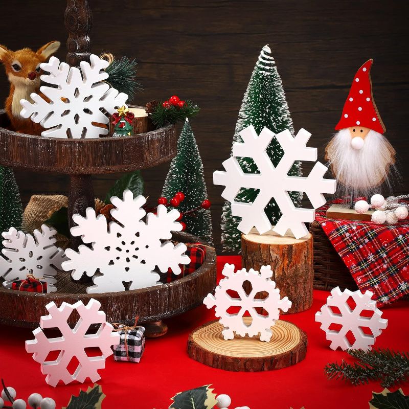 Photo 1 of 9 Pcs Christmas Wooden Snowflake Decor Winter Wood Snowflake Block White Snowflakes Decorations Winter Table Decor Christmas Standing Sign for Xmas Fireplace Mantel Winter Home (Snowflake Style)
