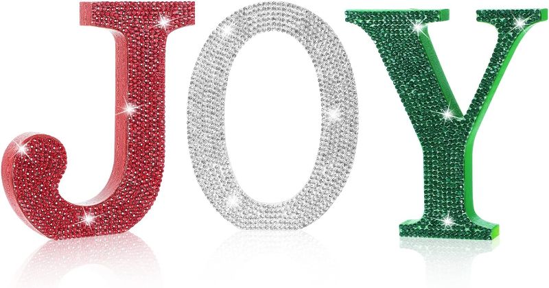 Photo 1 of 3 Pieces Rhinestone Joy Signs Letters Christmas Wood Table Decorations, Freestanding Block Joy Cutout Letters with Rhinestone Decor for Xmas, New Year, Home Decorations
