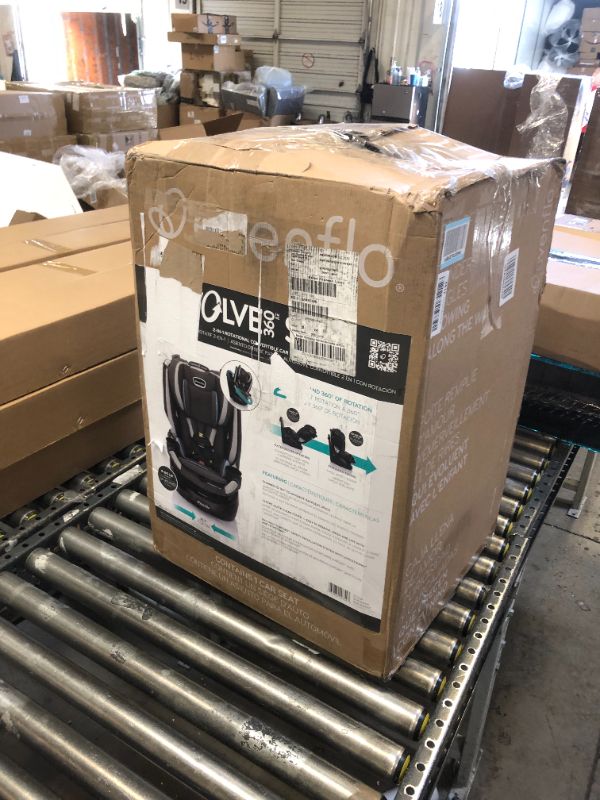 Photo 1 of Evenflo Revolve360 Slim 2-in-1 Rotational Car Seat with Quick Clean Cover (Stow Blue) Revolve Slim Quick Clean Cover Stow Blue