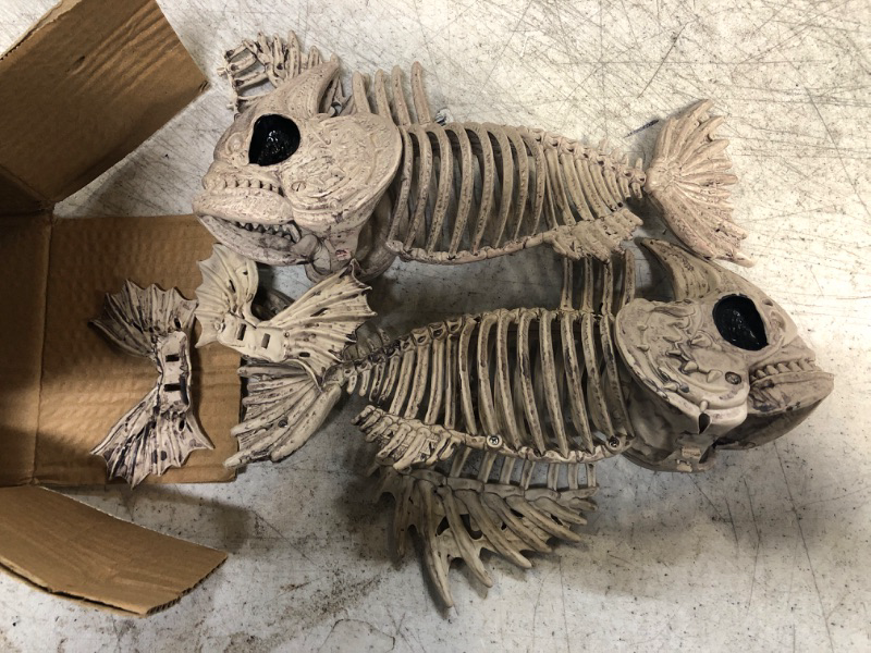 Photo 1 of JOYIN Halloween Skeleton Fish with LED Eye for Halloween Decoration, Graveyard Decorations, Indoor/Outdoor Spooky Scene
