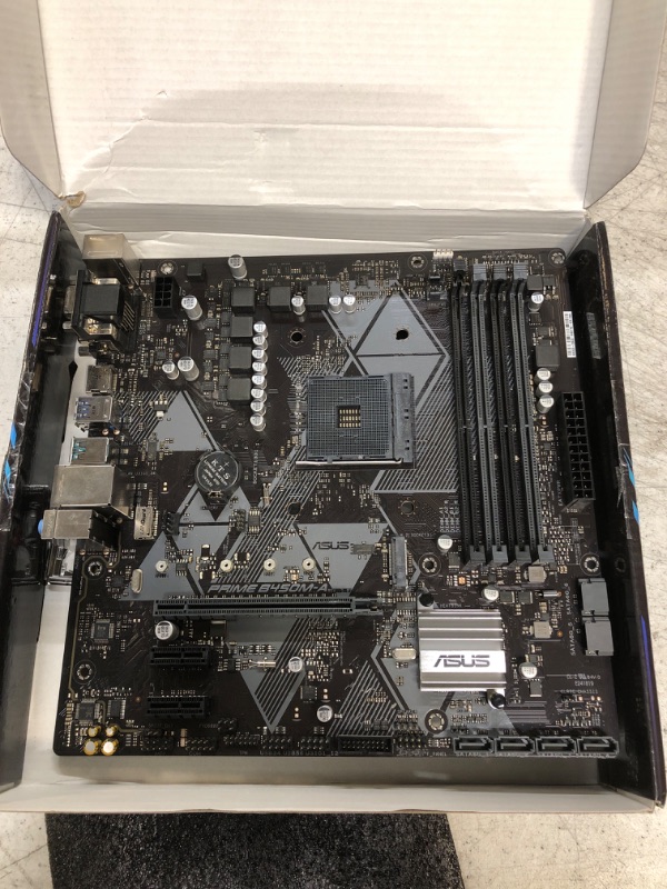 Photo 2 of ASUS Prime B450M-A II AMD AM4 (Ryzen 5000, 3rd/2nd/1st Gen Ryzen Micro ATX Motherboard (128GB DDR4, 4400 O.C.), NVMe, HDMI 2.0b/DVI/D-Sub, USB 3.2 2, BIOS Flashback, and Aura Sync)
