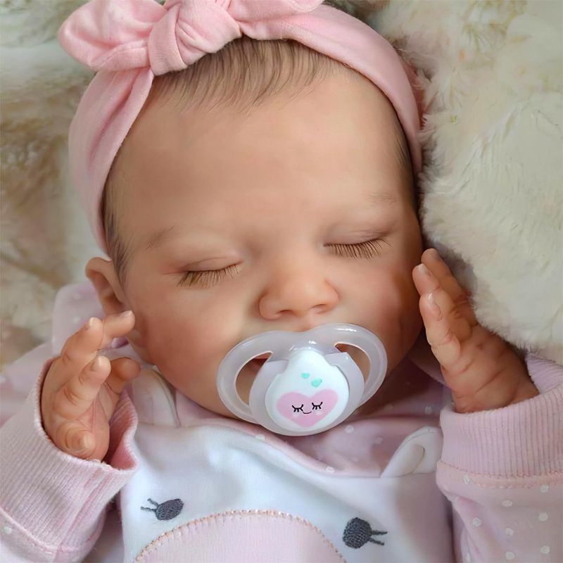 Photo 1 of BABESIDE Lifelike Reborn Baby Dolls - 20-Inch Sweet Smile Real Life Realistic-Newborn Full Body Vinyl Sleeping Baby Girl with Toy Accessories Gift Set for Kids Age 3+
