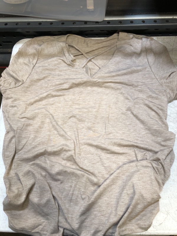 Photo 1 of womens shirt- cross v neck
size large