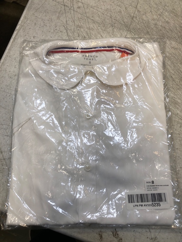 Photo 1 of boys shirt size- 8 
white- short sleeve